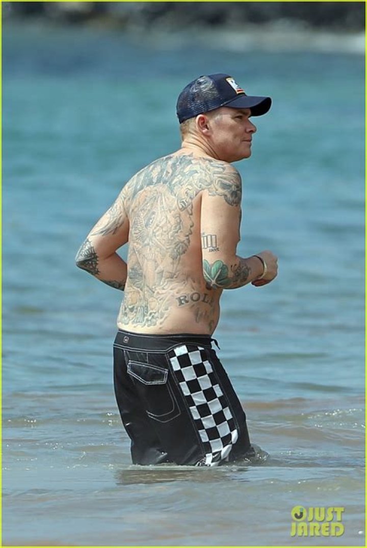 Tommy Hilfiger: Wife, net worth, tattoos, smoking & body facts